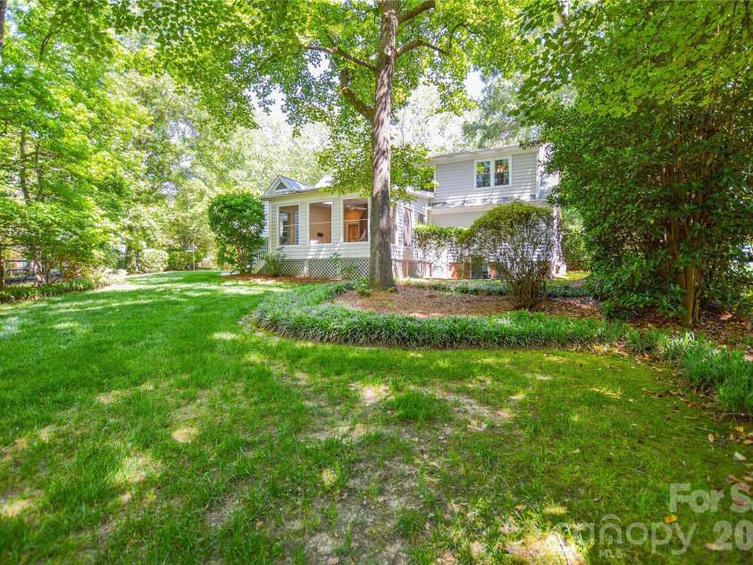 2922 Butter Churn Lane, Matthews, NC 28105.  MLS# CAR4361303, YatesRealty ID 21985. Landscaped back yard 