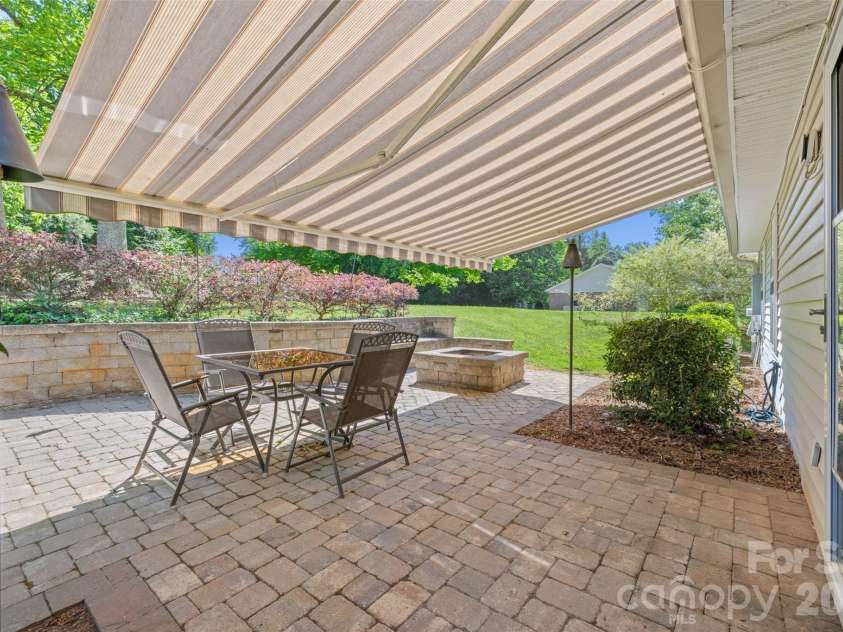 5821 Rowan Way, Charlotte, NC 28214.  MLS# CAR4380233, YatesRealty ID 21987. Back Pavers Patio with Covered SunSetter Awning for Entertaining