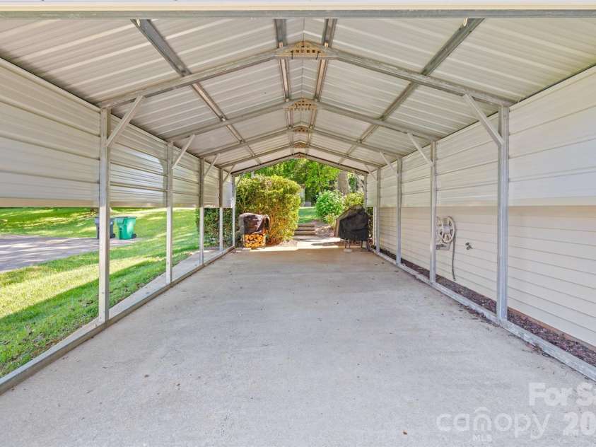 5821 Rowan Way, Charlotte, NC 28214.  MLS# CAR4380233, YatesRealty ID 21987. Covered Carport 