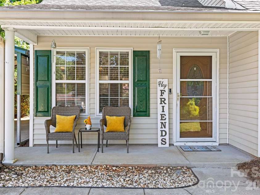 5821 Rowan Way, Charlotte, NC 28214.  MLS# CAR4380233, YatesRealty ID 21987. Covered Front Porch with Sitting Area 