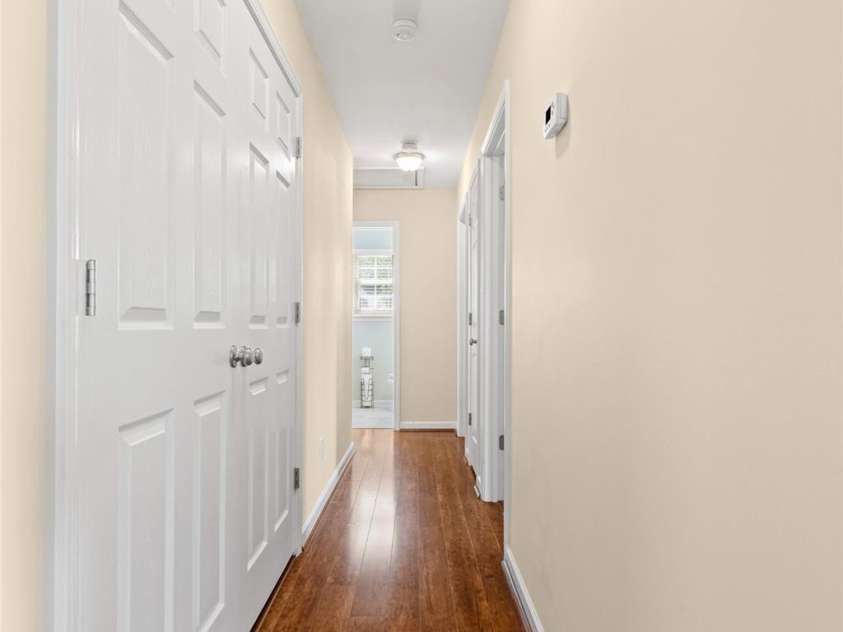 5821 Rowan Way, Charlotte, NC 28214.  MLS# CAR4380233, YatesRealty ID 21987. Hallway leading to the Bedrooms