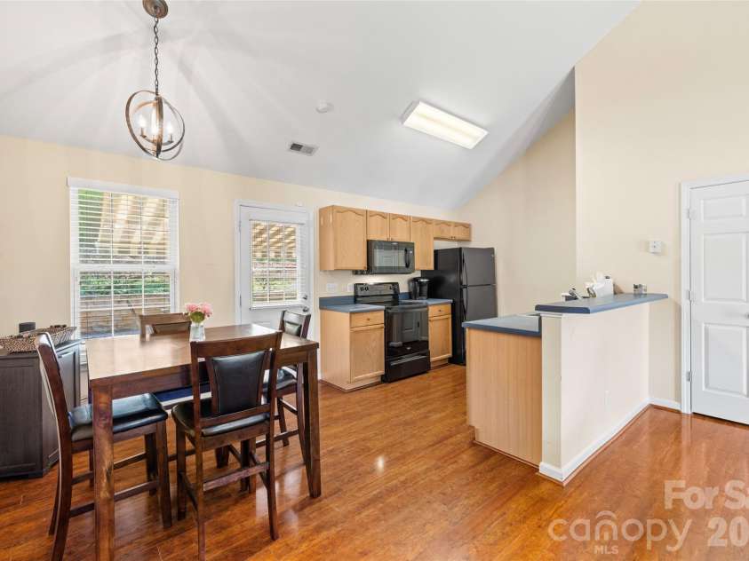 5821 Rowan Way, Charlotte, NC 28214.  MLS# CAR4380233, YatesRealty ID 21987. Kitchen and Dining Area 