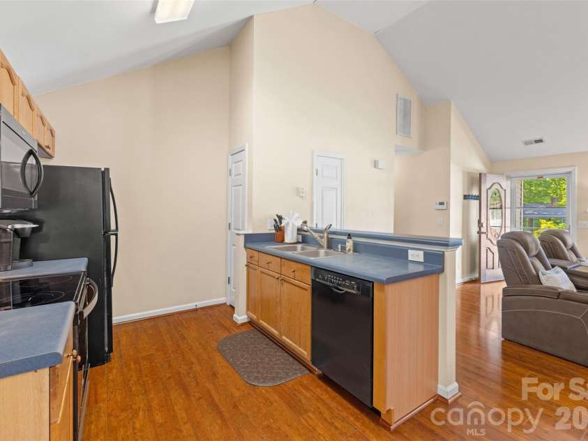 5821 Rowan Way, Charlotte, NC 28214.  MLS# CAR4380233, YatesRealty ID 21987. Kitchen Open the Family Room