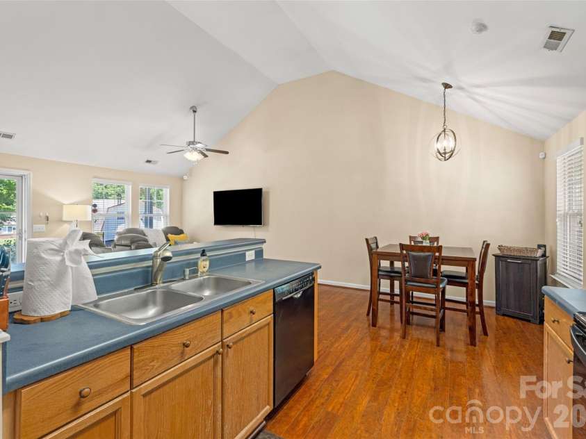 5821 Rowan Way, Charlotte, NC 28214.  MLS# CAR4380233, YatesRealty ID 21987. Kitchen open to Dining Room