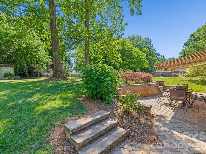 5821 Rowan Way, Charlotte, NC 28214.  MLS# CAR4380233, YatesRealty ID 21987. Steps leading to Private Backyard 