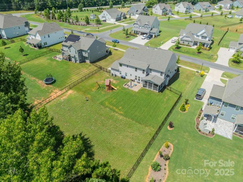849 Yucatan Drive, Waxhaw, NC 28173.  MLS# CAR4281453, YatesRealty ID 2199. Aerial view of backyard