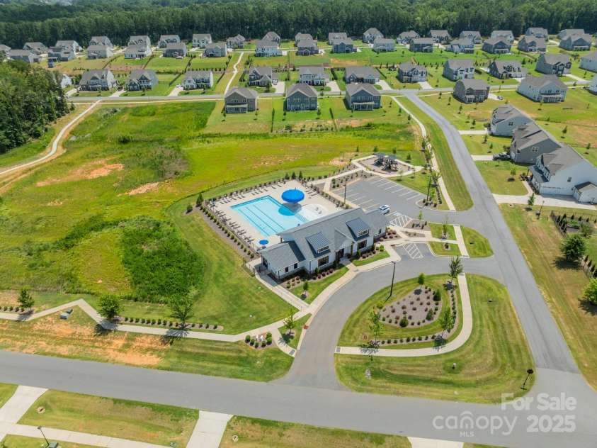849 Yucatan Drive, Waxhaw, NC 28173.  MLS# CAR4281453, YatesRealty ID 2199. Aerial view of community Pool