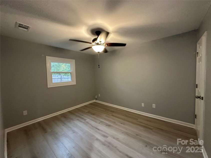10517 Starwood Drive, Charlotte, NC 28215.  MLS# CAR4316588, YatesRealty ID 21995. Main BedroomBedroom 3