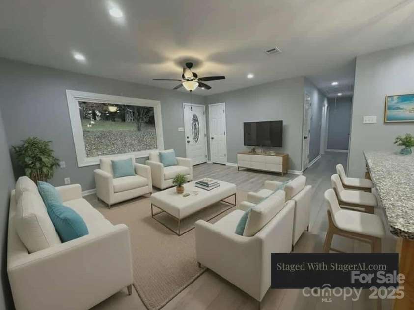 10517 Starwood Drive, Charlotte, NC 28215.  MLS# CAR4316588, YatesRealty ID 21995. Virtually staged Living Room Area