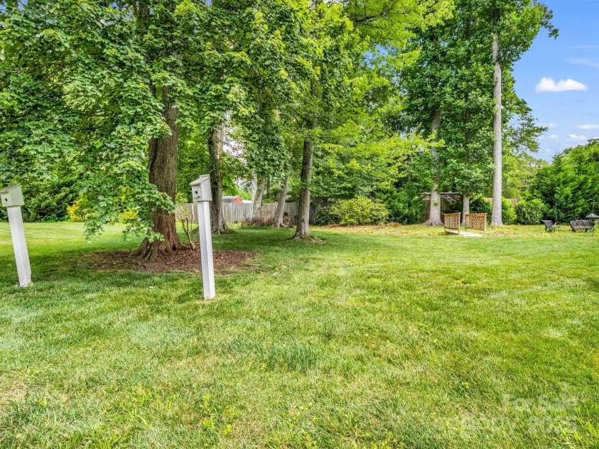 114 Fairway View Drive, Etowah, NC 28729.  MLS# CAR4270045, YatesRealty ID 21996. Level Back Yard & Common Area