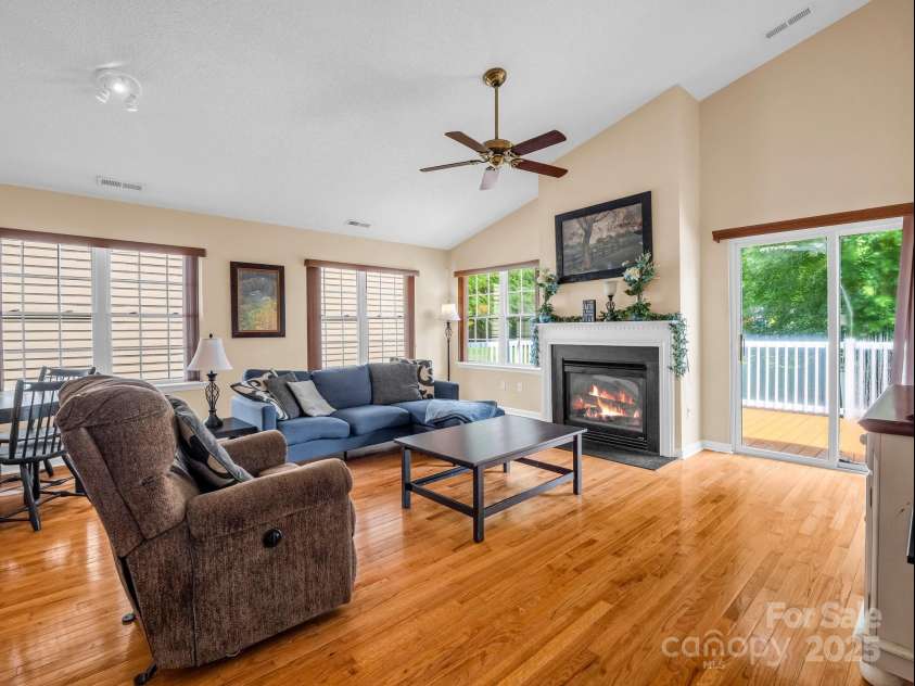 114 Fairway View Drive, Etowah, NC 28729.  MLS# CAR4270045, YatesRealty ID 21996. Living Room with Cathedral Ceiling