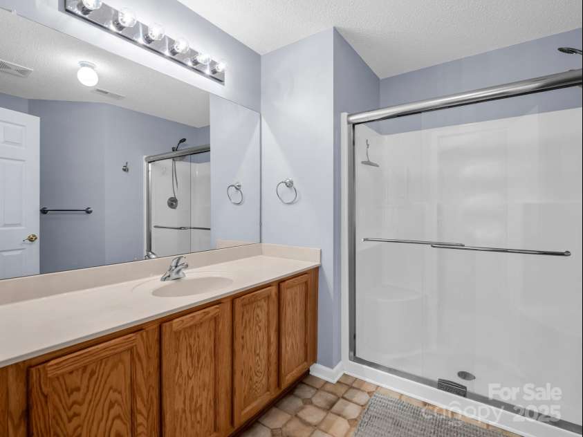 114 Fairway View Drive, Etowah, NC 28729.  MLS# CAR4270045, YatesRealty ID 21996. Primary Bathroom