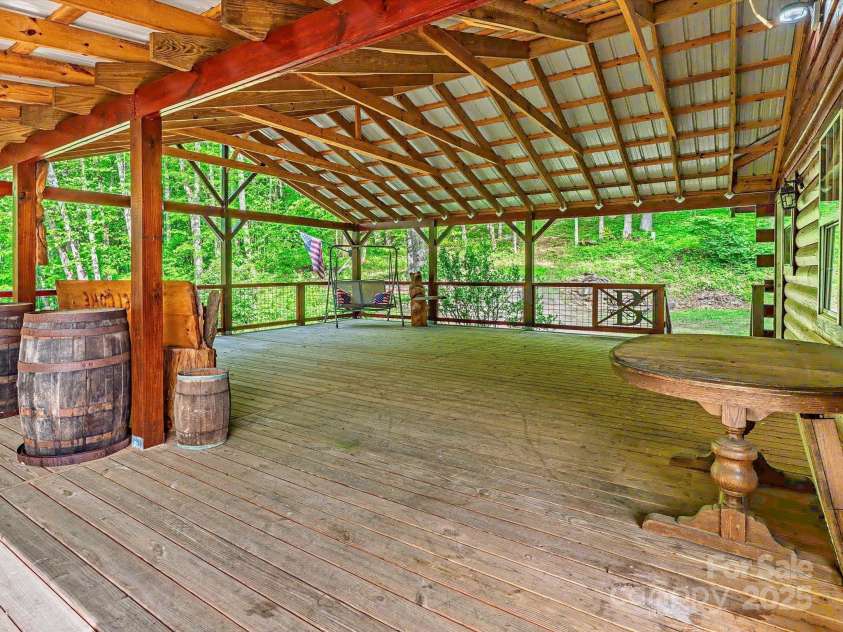 287 Sara Ridge Road, Waynesville, NC 28786.  MLS# CAR4260530, YatesRealty ID 21997. Another angle of this amazing deck