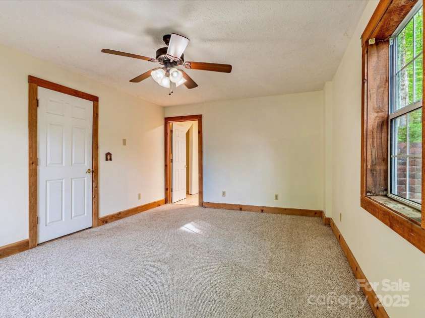 287 Sara Ridge Road, Waynesville, NC 28786.  MLS# CAR4260530, YatesRealty ID 21997. Basement garage access in the downstairs bonus room