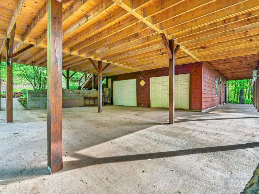 287 Sara Ridge Road, Waynesville, NC 28786.  MLS# CAR4260530, YatesRealty ID 21997. Great storage and parking area