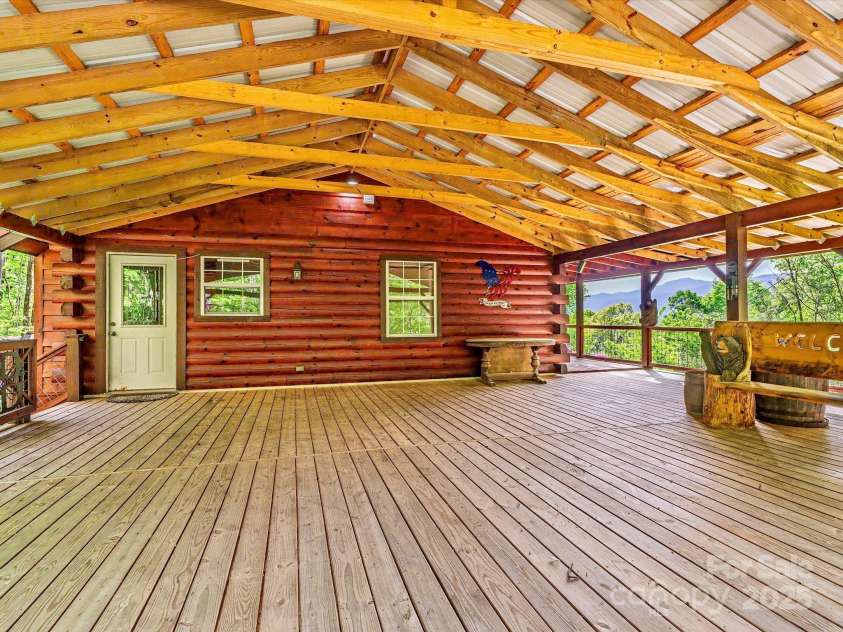 287 Sara Ridge Road, Waynesville, NC 28786.  MLS# CAR4260530, YatesRealty ID 21997. Huge covered deck perfect for outdoor entertaining