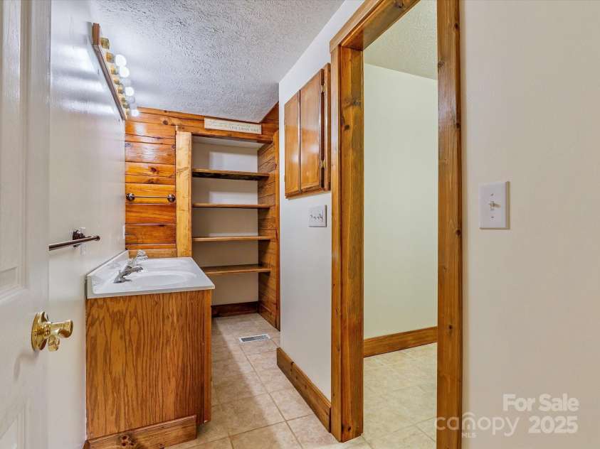 287 Sara Ridge Road, Waynesville, NC 28786.  MLS# CAR4260530, YatesRealty ID 21997. Primary bathroom