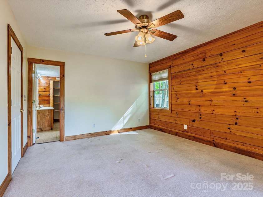 287 Sara Ridge Road, Waynesville, NC 28786.  MLS# CAR4260530, YatesRealty ID 21997. Primary bedroom on the main level
