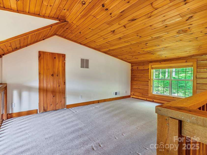 287 Sara Ridge Road, Waynesville, NC 28786.  MLS# CAR4260530, YatesRealty ID 21997. The loft includes stand-iup, unheated storage