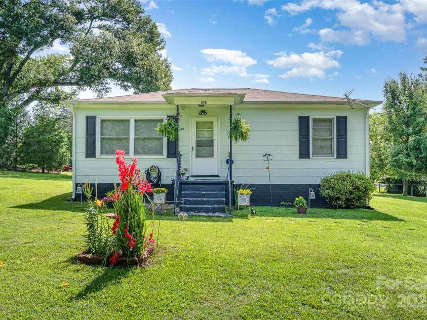 422 Wilson Street, Mount Holly, NC 28120.  MLS# CAR4272159, YatesRealty ID 22001. Front of 416 Wilson