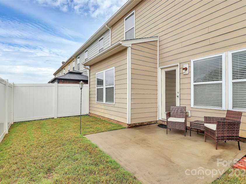 2840 Hopeton Court, Monroe, NC 28110.  MLS# CAR4264962, YatesRealty ID 22002. Back patio