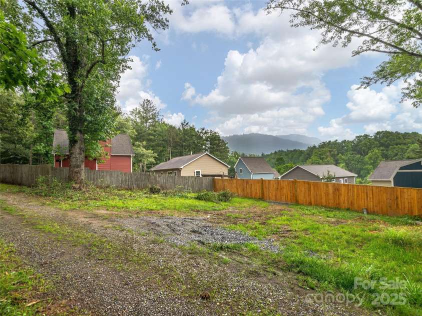 78 Chapel Road, Asheville, NC 28803.  MLS# CAR4273027, YatesRealty ID 22006. Cleared outdoor space, accessible by shared drive.