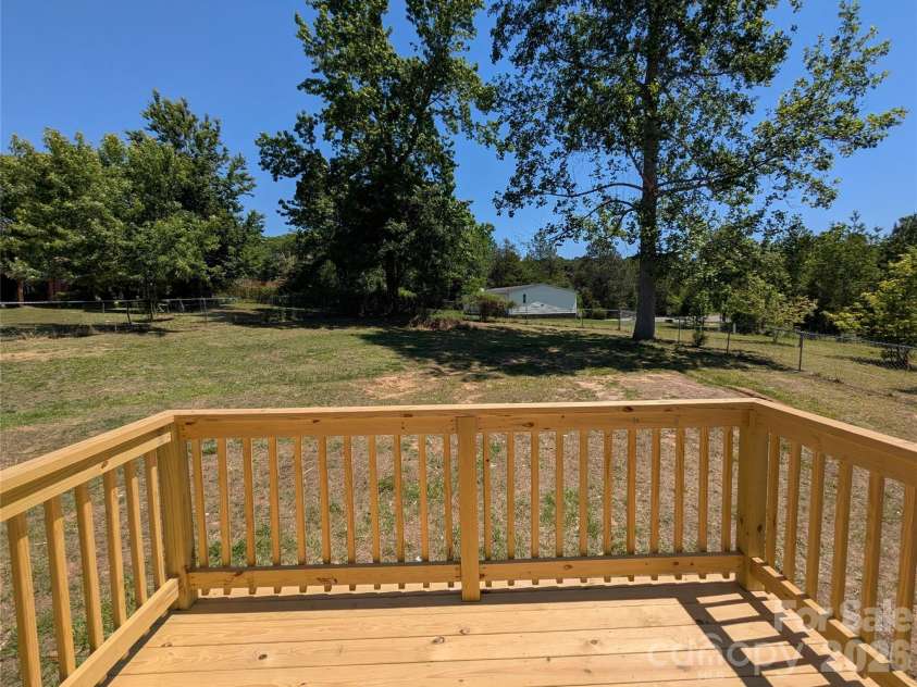 2032 Rocky Creek Lane, Dallas, NC 28034.  MLS# CAR4377210, YatesRealty ID 22007. Back deck