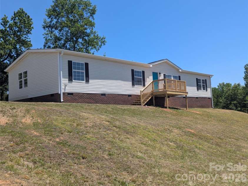 2032 Rocky Creek Lane, Dallas, NC 28034.  MLS# CAR4377210, YatesRealty ID 22007. Front exterior