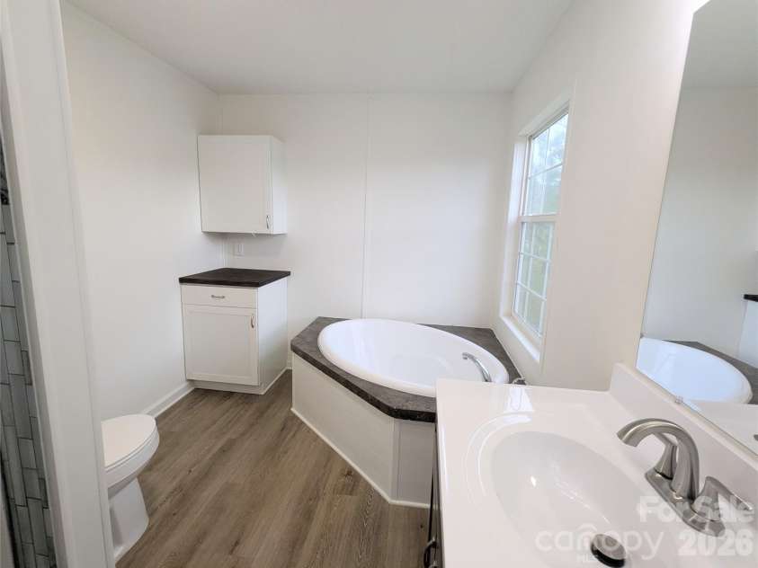2032 Rocky Creek Lane, Dallas, NC 28034.  MLS# CAR4377210, YatesRealty ID 22007. Primary bathroom