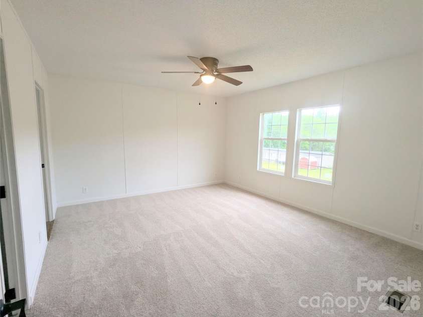 2032 Rocky Creek Lane, Dallas, NC 28034.  MLS# CAR4377210, YatesRealty ID 22007. Primary bedroom