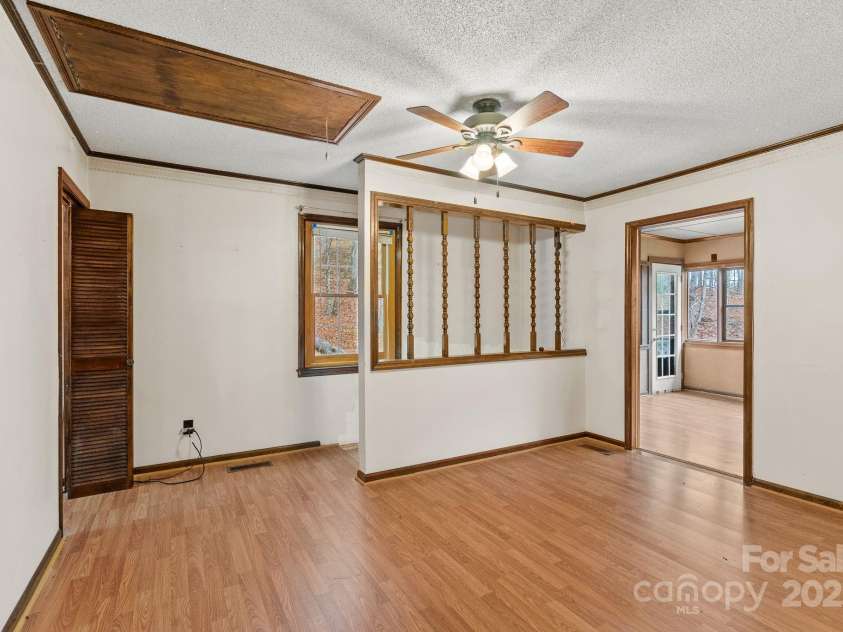 61 Doe Loop, Hot Springs, NC 28743.  MLS# CAR4295989, YatesRealty ID 2201. Bedroom w/stairs to basement