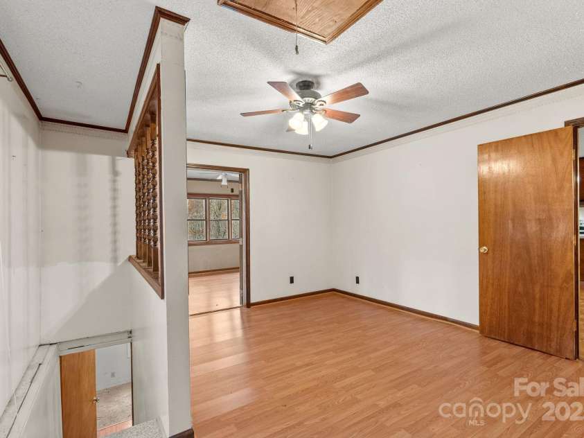 61 Doe Loop, Hot Springs, NC 28743.  MLS# CAR4295989, YatesRealty ID 2201. Bedroom w/stairs to basement