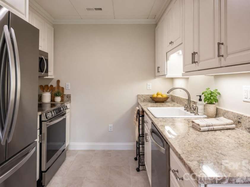 301 Winding Meadows Drive, Flat Rock, NC 28731.  MLS# CAR4381410, YatesRealty ID 22014. Virtually Staged