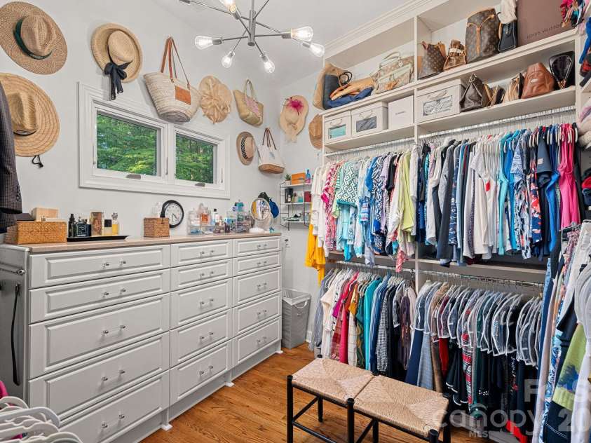 107 Beachview Drive, Mooresville, NC 28117.  MLS# CAR4377535, YatesRealty ID 22019. An oversized walk-in closet with custom storage
