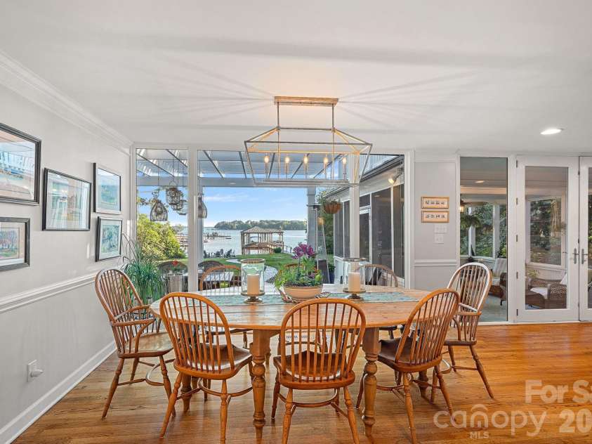 107 Beachview Drive, Mooresville, NC 28117.  MLS# CAR4377535, YatesRealty ID 22019. Dining with a beautiful lake backdrop