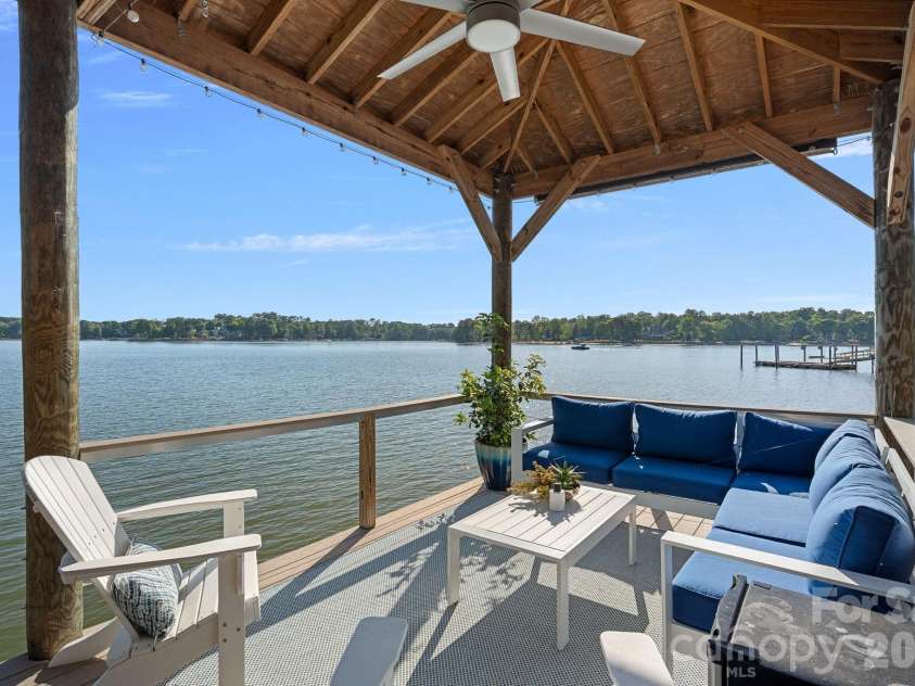 107 Beachview Drive, Mooresville, NC 28117.  MLS# CAR4377535, YatesRealty ID 22019. Exceptional views days for lakeside enjoyment