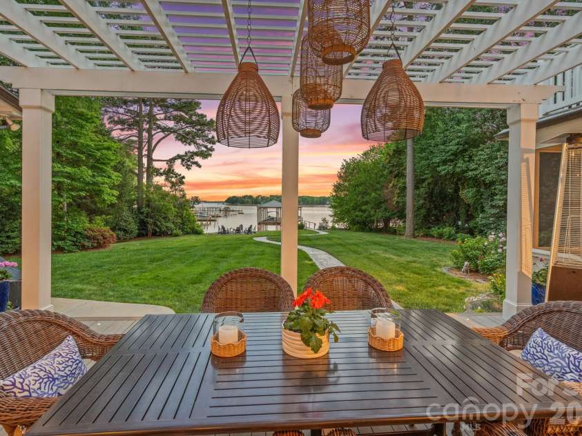 107 Beachview Drive, Mooresville, NC 28117.  MLS# CAR4377535, YatesRealty ID 22019. Outdoor living with panoramic lake views