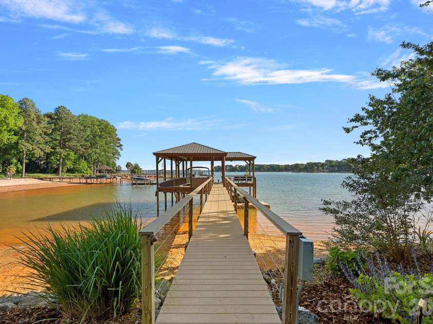 107 Beachview Drive, Mooresville, NC 28117.  MLS# CAR4377535, YatesRealty ID 22019. Wide lake views protected just off the main channel
