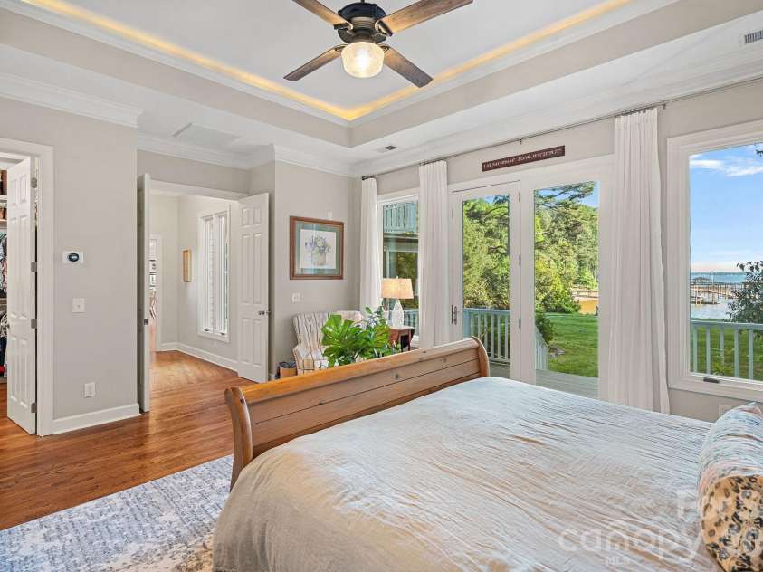 107 Beachview Drive, Mooresville, NC 28117.  MLS# CAR4377535, YatesRealty ID 22019. Your private retreat is filled with natural light