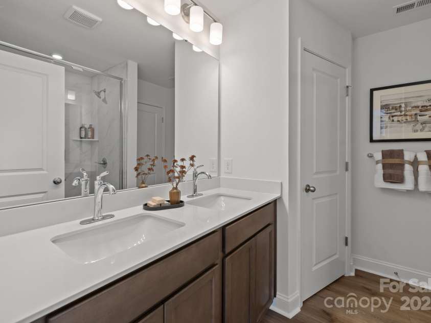 2233 Gladwyne Place, Charlotte, NC 28269.  MLS# CAR4330760, YatesRealty ID 2202. Representative Photo from Model - Owner's Bathroom