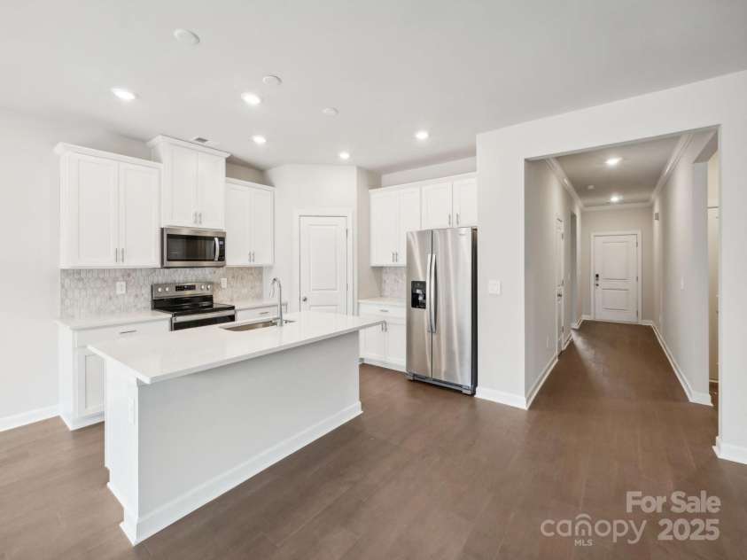 1422 Windy Park Drive, Stanley, NC 28164.  MLS# CAR4226948, YatesRealty ID 22022. Photo is not of the actual home, but is an inspirational photo of builder’s model home and may depict options, furnishings, and/or decorator features that are not included