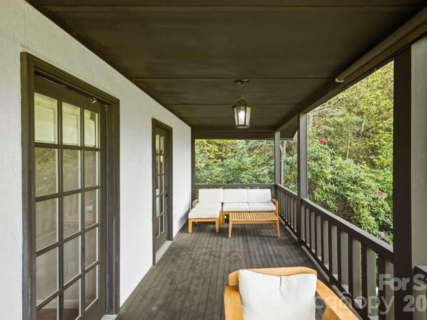 821 Summit Drive, Maggie Valley, NC 28751.  MLS# CAR4371108, YatesRealty ID 22022. Third floor covered balcony