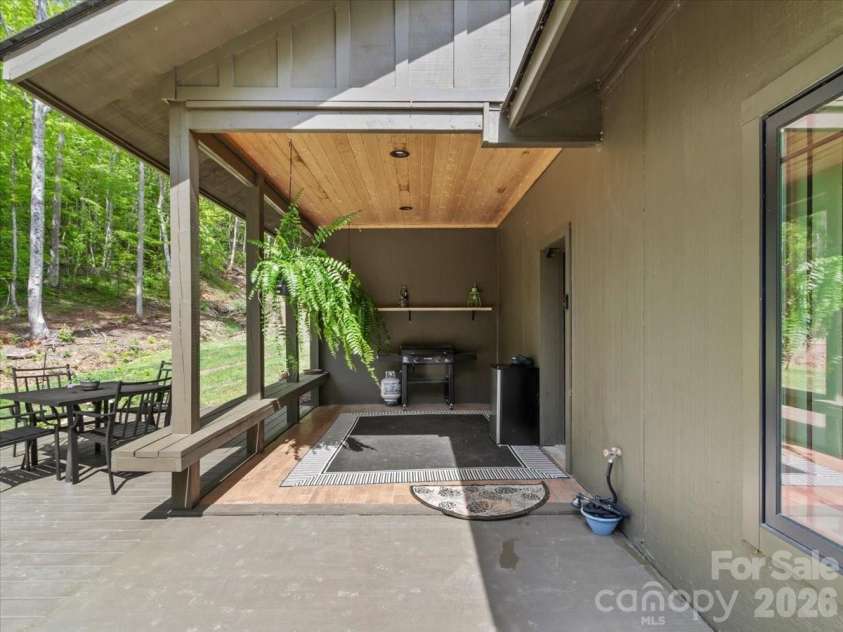 183 Mayfly Court, Spruce Pine, NC 28777.  MLS# CAR4377754, YatesRealty ID 22025. Back covered deck