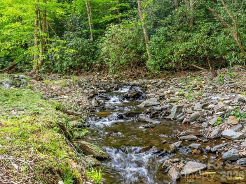 183 Mayfly Court, Spruce Pine, NC 28777.  MLS# CAR4377754, YatesRealty ID 22025. Big Crabtree Creek