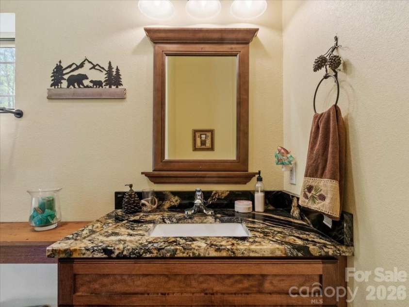 183 Mayfly Court, Spruce Pine, NC 28777.  MLS# CAR4377754, YatesRealty ID 22025. Guest Bathroom