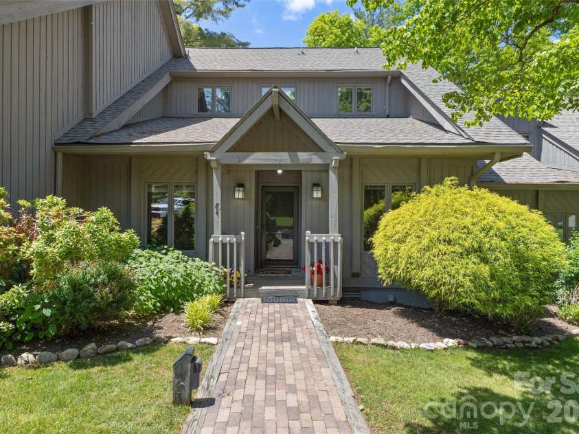84 Fairway Villas Drive, Sapphire, NC 28774.  MLS# CAR4381824, YatesRealty ID 22026. 