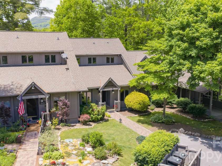84 Fairway Villas Drive, Sapphire, NC 28774.  MLS# CAR4381824, YatesRealty ID 22026. 