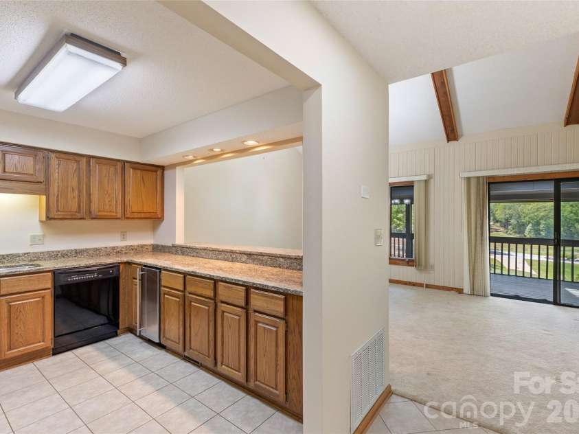 84 Fairway Villas Drive, Sapphire, NC 28774.  MLS# CAR4381824, YatesRealty ID 22026. 