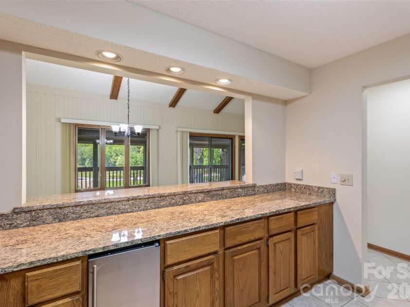 84 Fairway Villas Drive, Sapphire, NC 28774.  MLS# CAR4381824, YatesRealty ID 22026. 