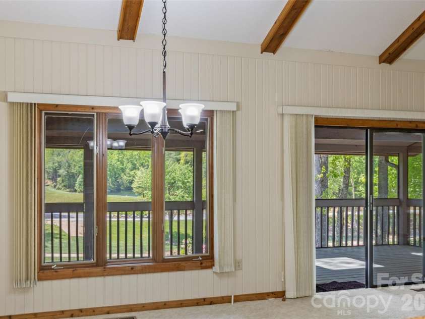 84 Fairway Villas Drive, Sapphire, NC 28774.  MLS# CAR4381824, YatesRealty ID 22026. 
